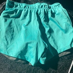 3 Pair Nike Dri-Fit Women's Athletic Shorts in black, grey and turquoise